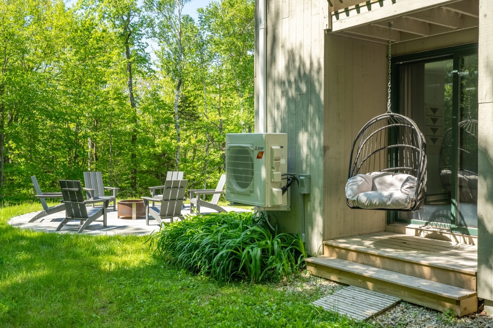 Hilltop Hideaway hanging chair and fire pit circle