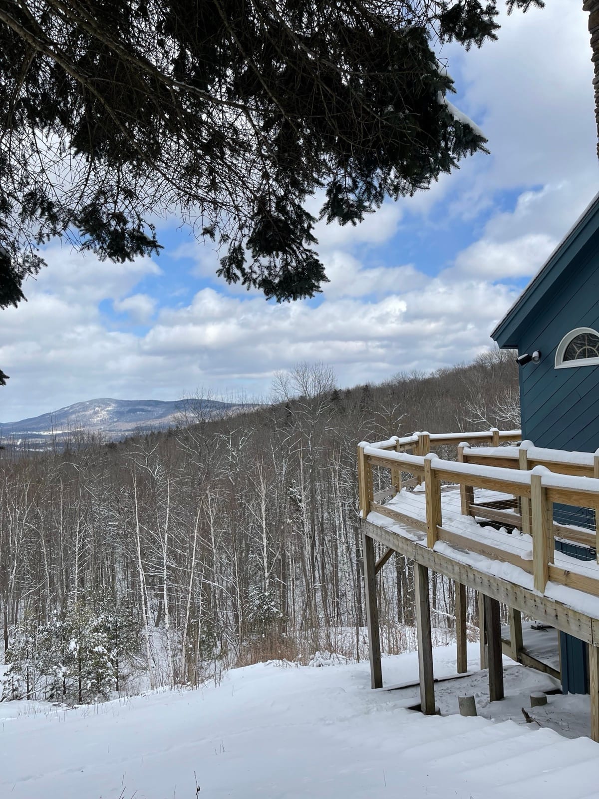 Shred Shack winter deck with mountain and valley views
