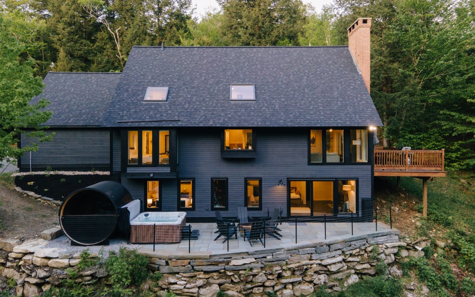 Wandering Moose rear exterior with barrel sauna and hot tub